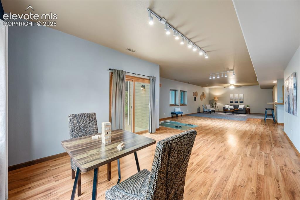 Image 29 of 36: Upper level primary has a large walk in closet with dressing area and stora