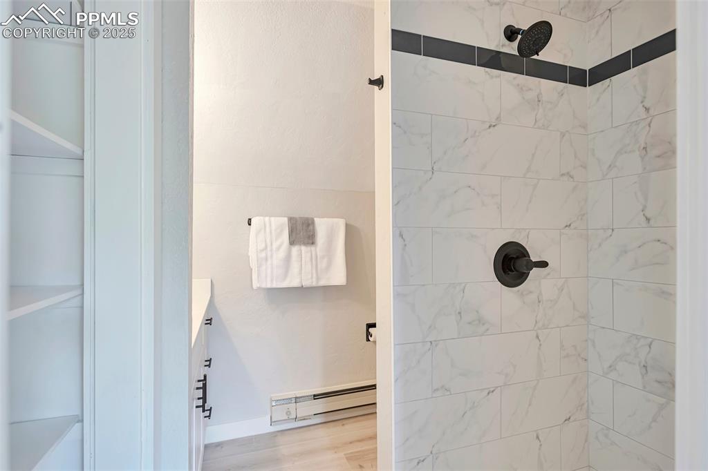 Image 19 of 33: Bathroom with beautiful Tile Shower