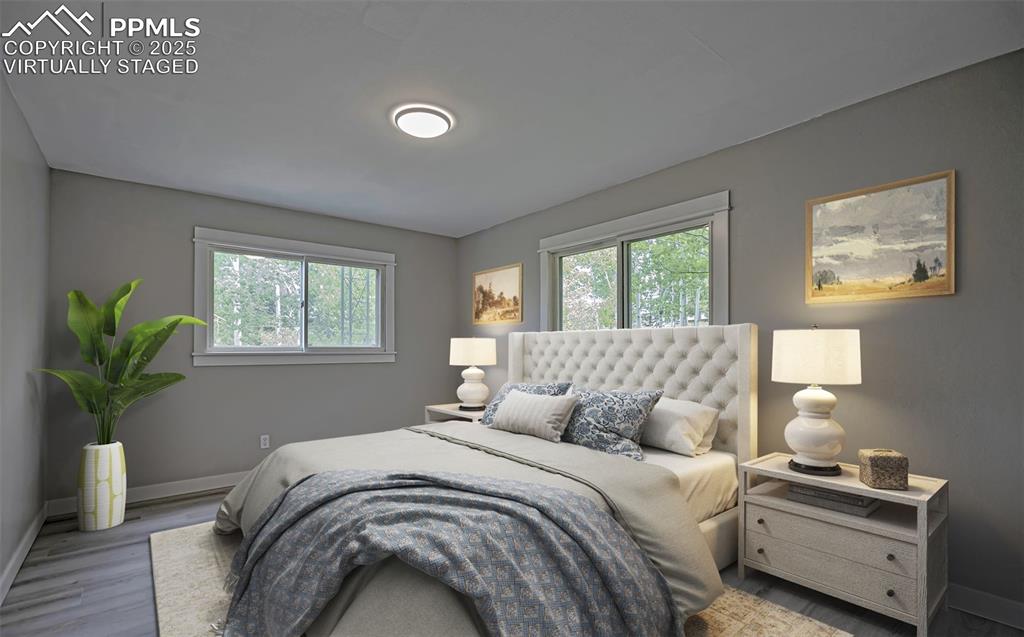 Image 5 of 33: Primary Bedroom. Virtually Staged.
