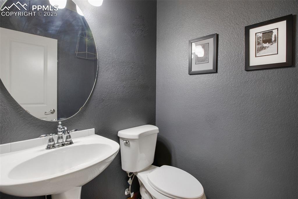 Image 18 of 35: Main level bathroom