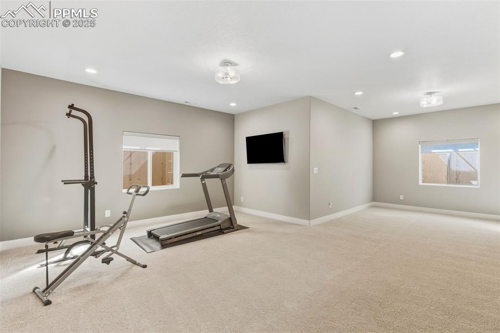 Image 43 of 49: Workout room featuring carpet and recessed lighting
