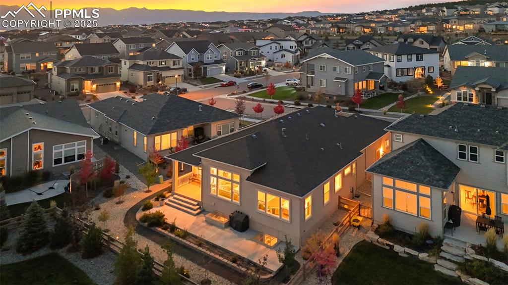 Image 6 of 49: Aerial view at dusk of a residential view