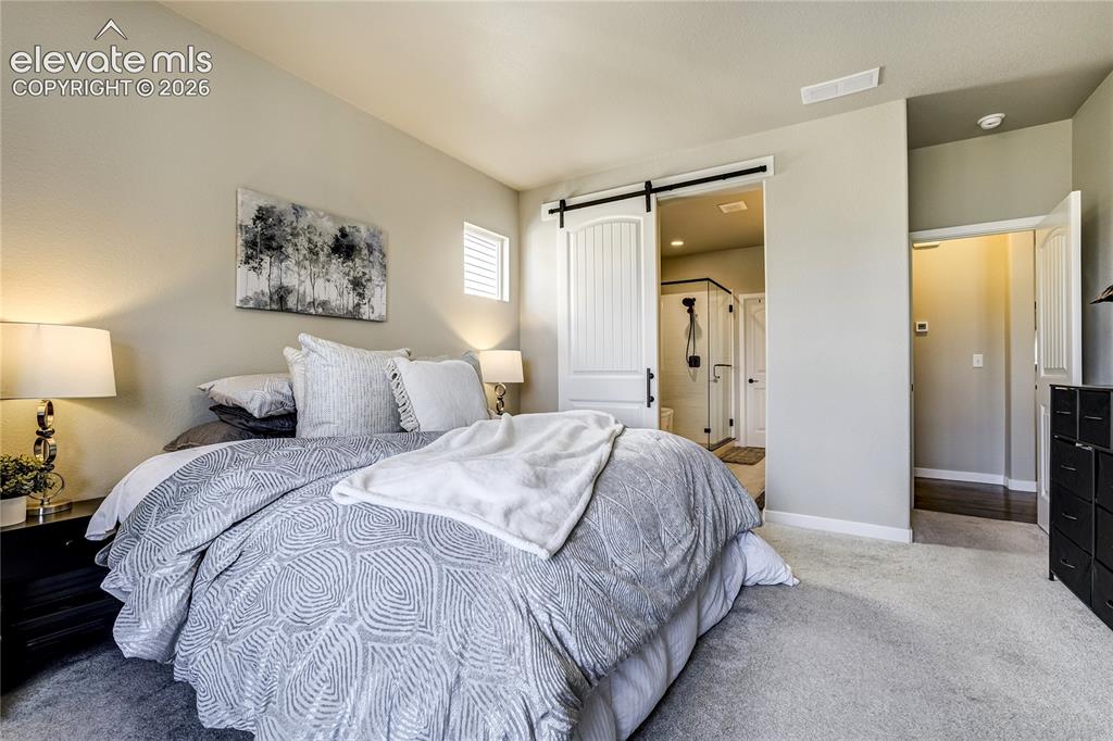 Image 21 of 50: Master Bedroom