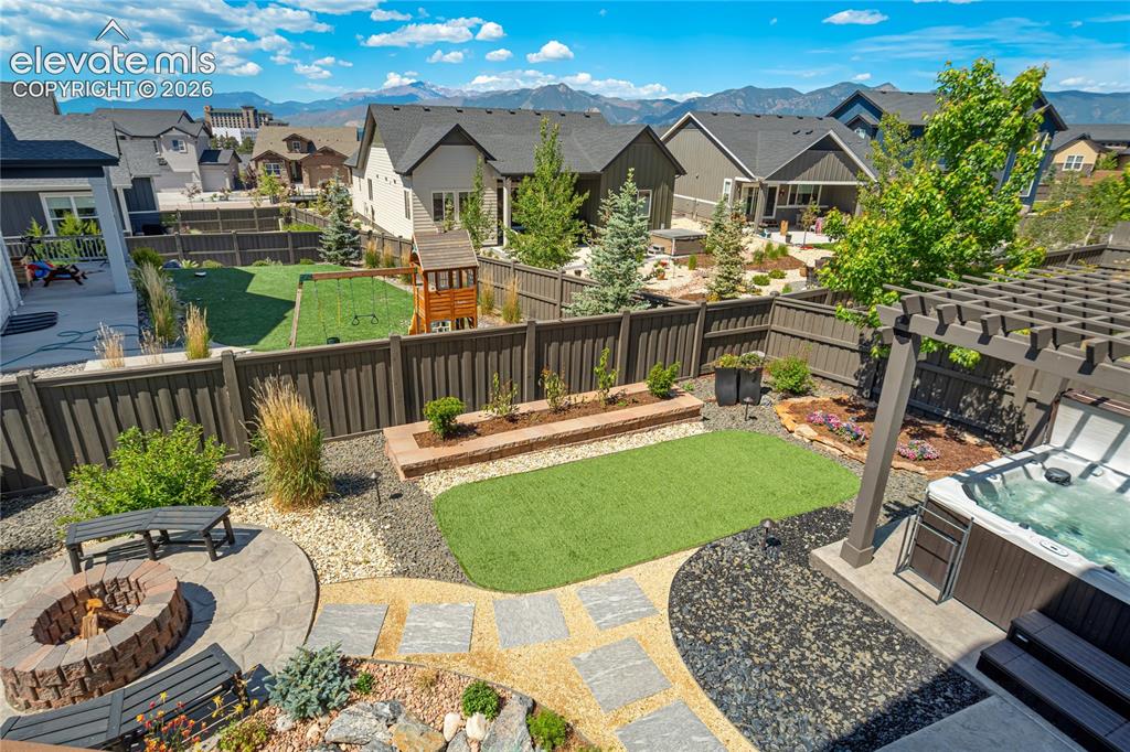 Image 35 of 50: Designed to Enjoy |
Beautiful hardscaping, thoughtful landscaping, and mul