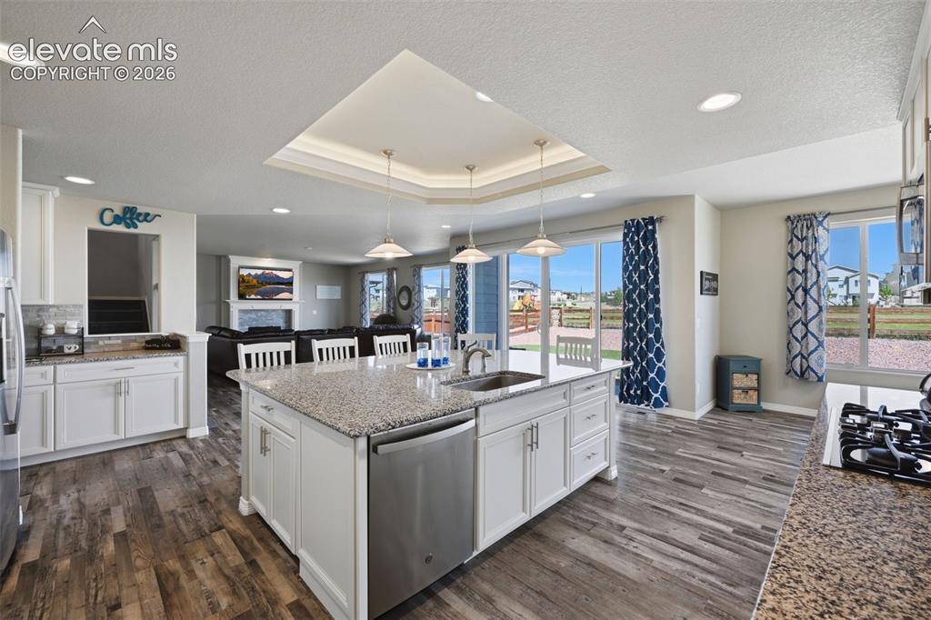 Image 3 of 43: Gourmet Kitchen with Oversized Island