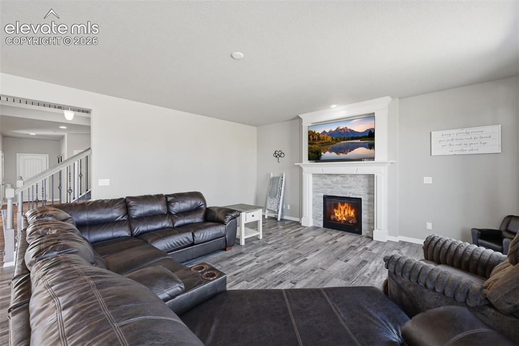 Image 6 of 43: Great Room with Fireplace