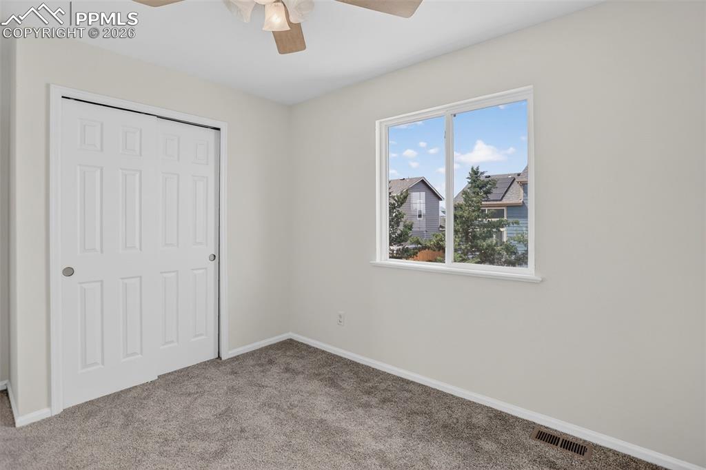 Image 9 of 16: Second Bedroom