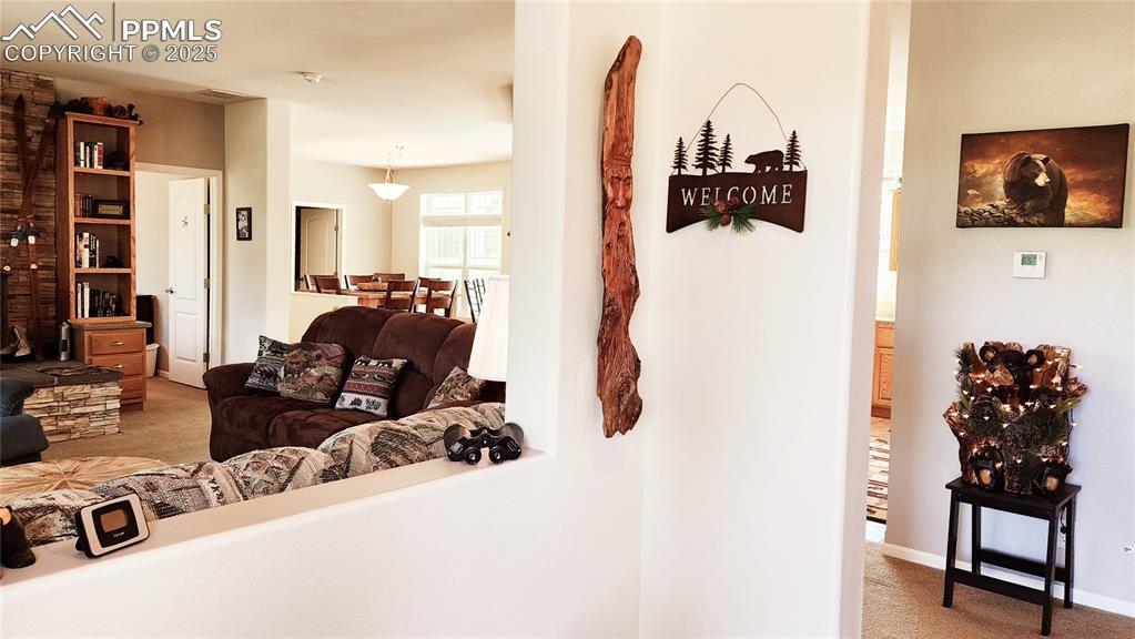 Image 11 of 50: dedicated entry hall with coat closet and bench