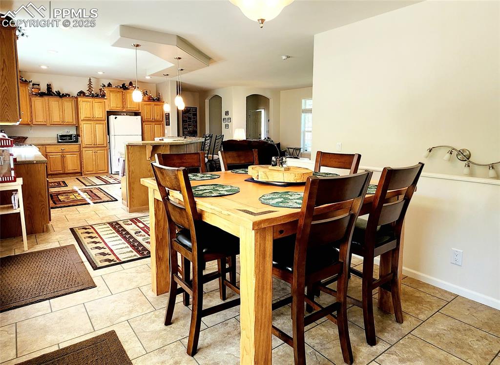 Image 20 of 50: This amazing square dining room table can seat up to 8 guests and can stay 