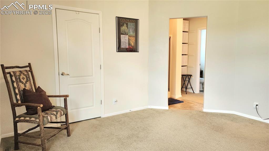 Image 23 of 50: space for sitting area. WIC and ensuite bath