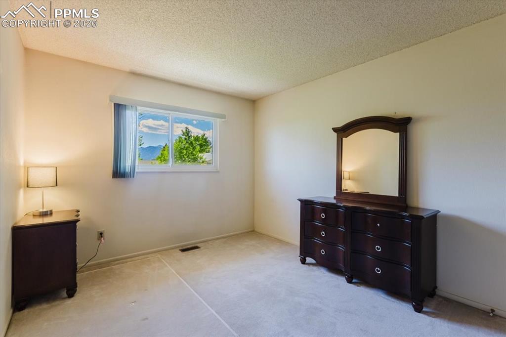 Image 11 of 44: Bedroom