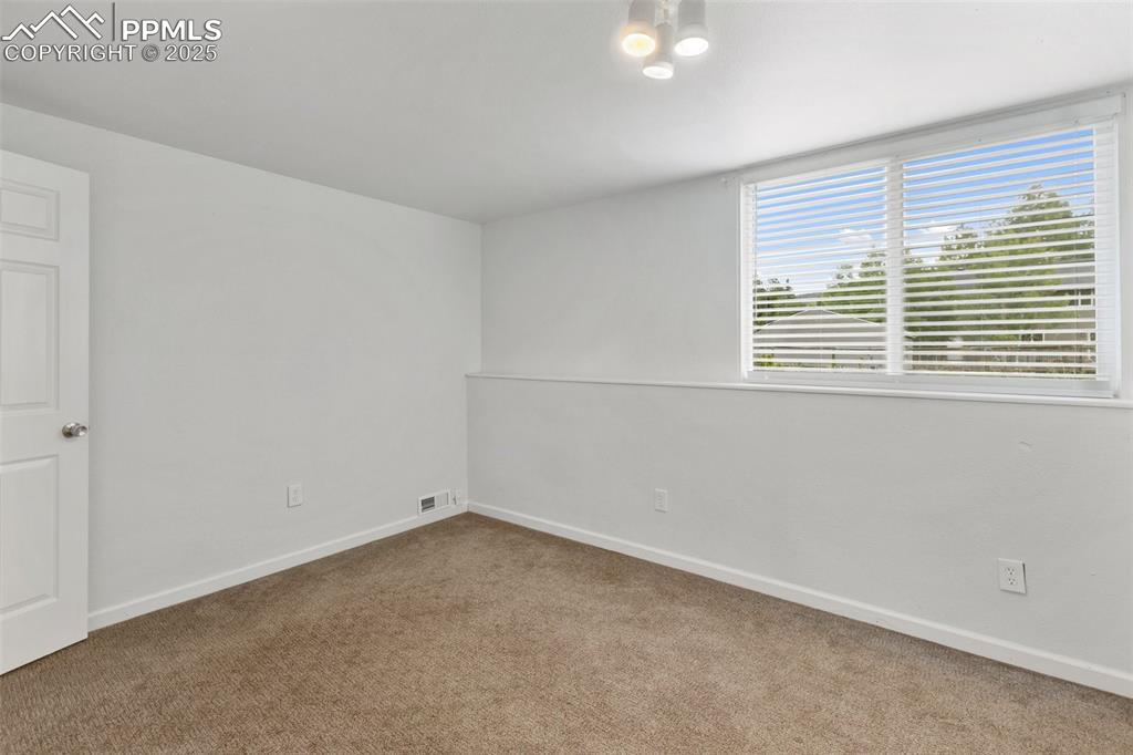 Image 34 of 43: Bedroom