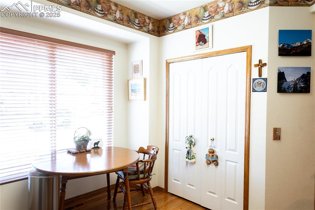 Image 12 of 48: Dining space featuring light wood-style flooring