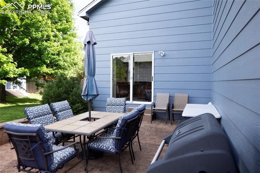 Image 21 of 48: View of patio / terrace featuring outdoor dining area