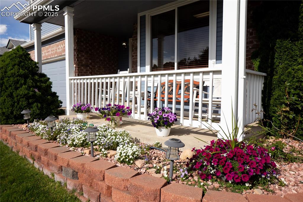 Image 3 of 48: View of front of property featuring a residential view, a porch, concrete d