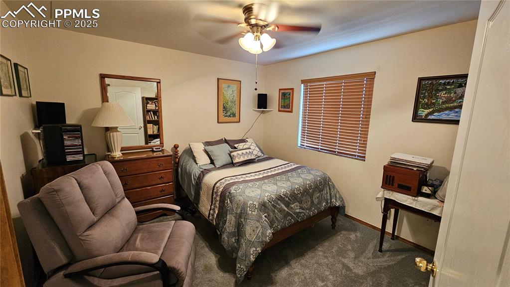 Image 31 of 48: Bedroom featuring carpet and ceiling fan