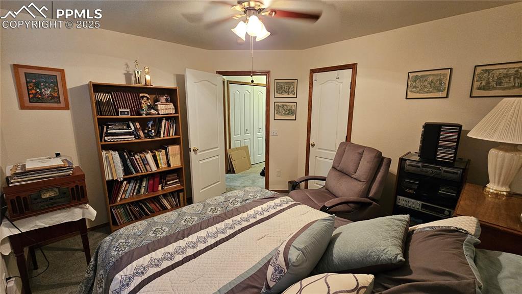 Image 32 of 48: Bedroom featuring carpet floors and ceiling fan
