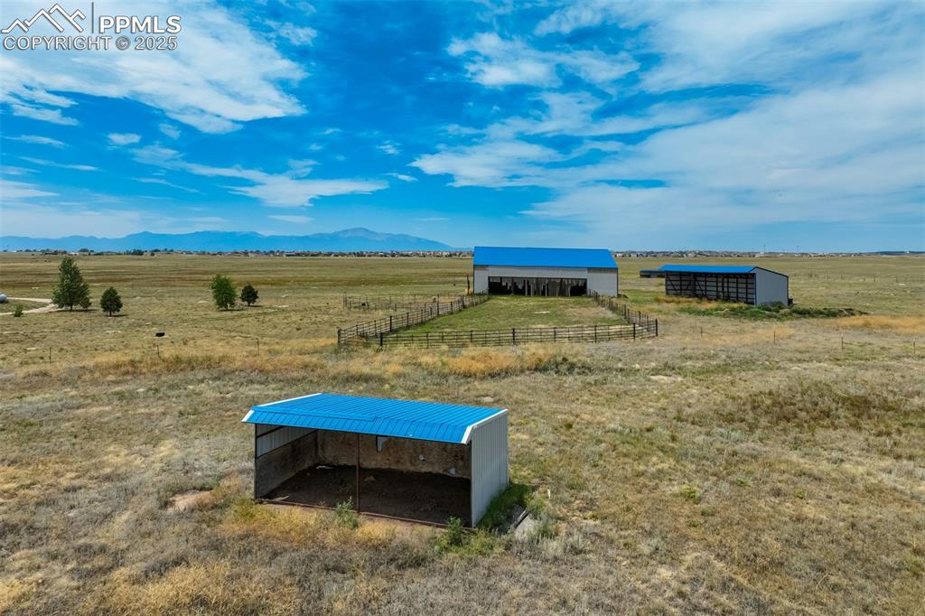 Image 43 of 50: View of mountain backdrop featuring rural landscape and agricultural land