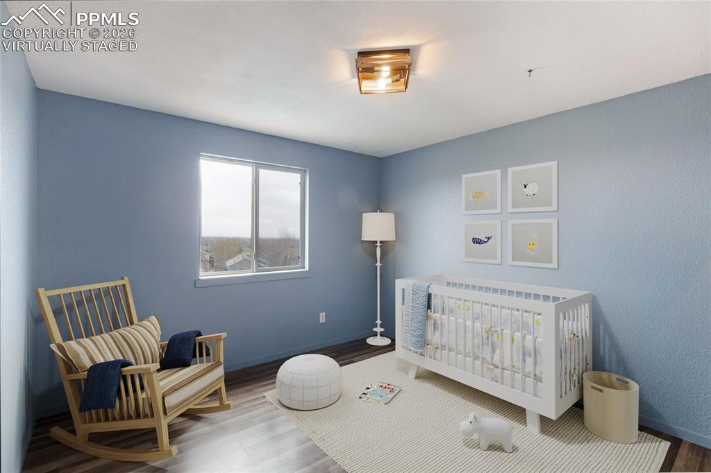 Image 6 of 43:  virtually staged This room features a window providing  natural light, lig