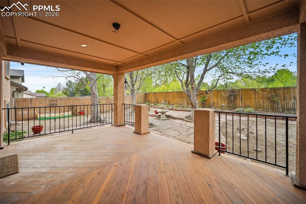 Image 42 of 50: Insulated deck R30 in deck ceiling and wrought iron rails. 
