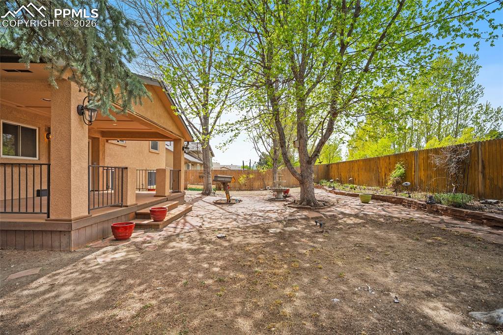 Image 46 of 50: Cedar Fully fenced and no neighbors behind you. Raised garden beds, Accent 