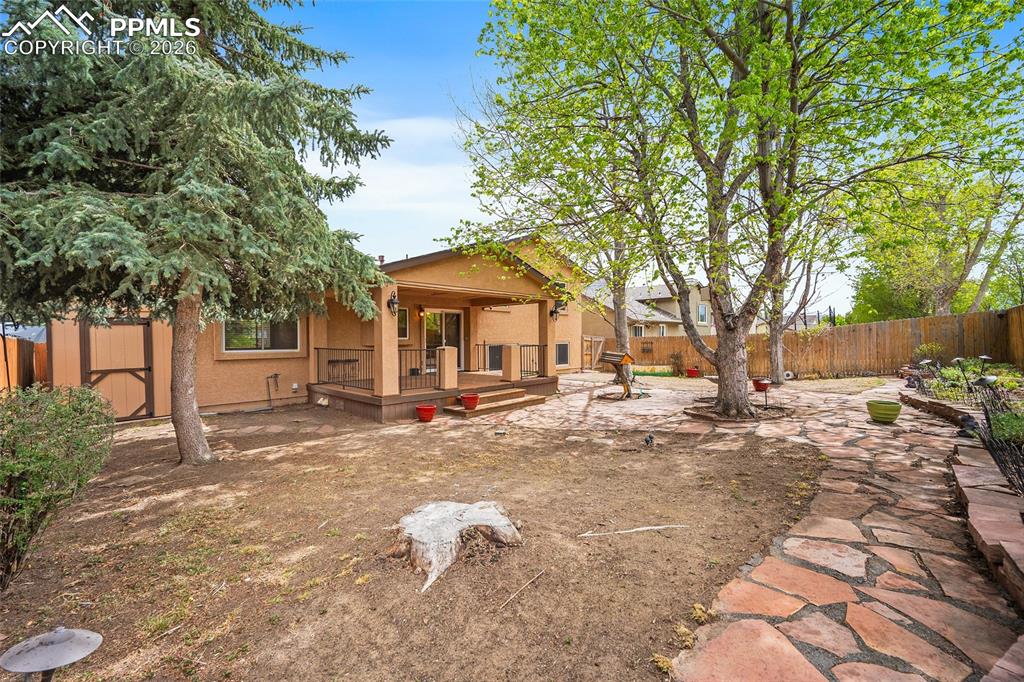 Image 47 of 50: Backyard backs to the Sante Fe Trail! 