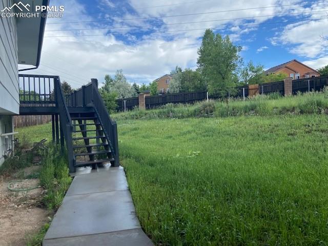 Image 21 of 26: View of yard with stairway
