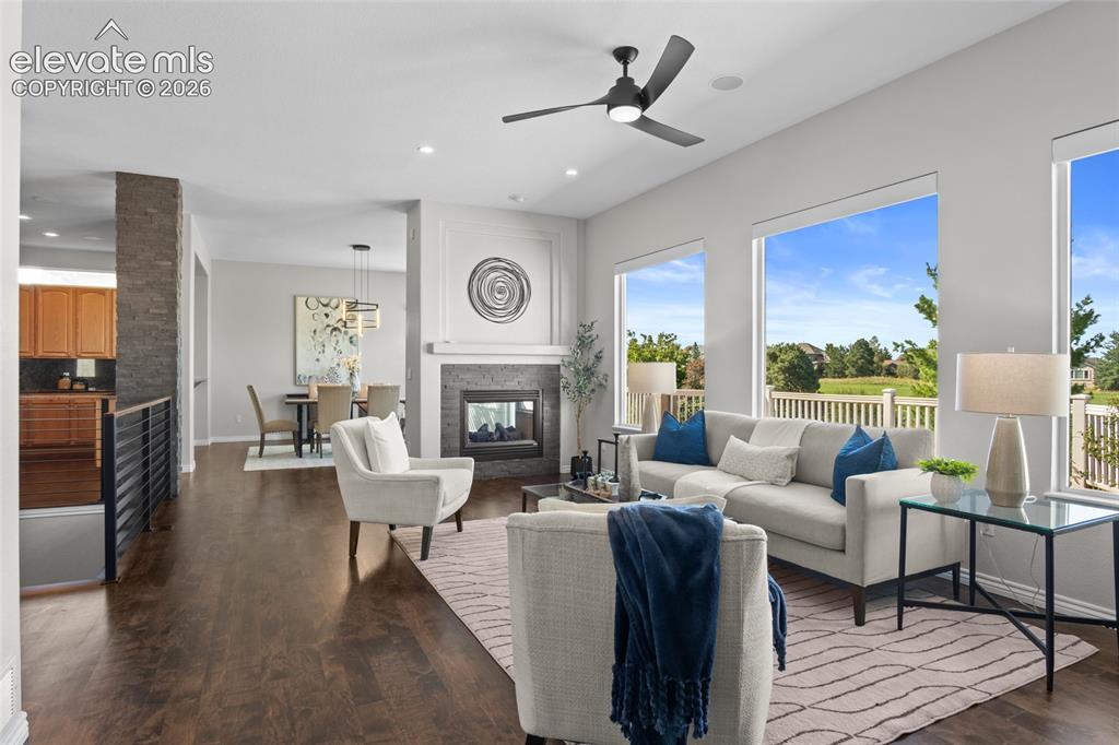 Image 15 of 44: Real Maple Hardwoods flow throught the main floor bringing beauty & warmth.