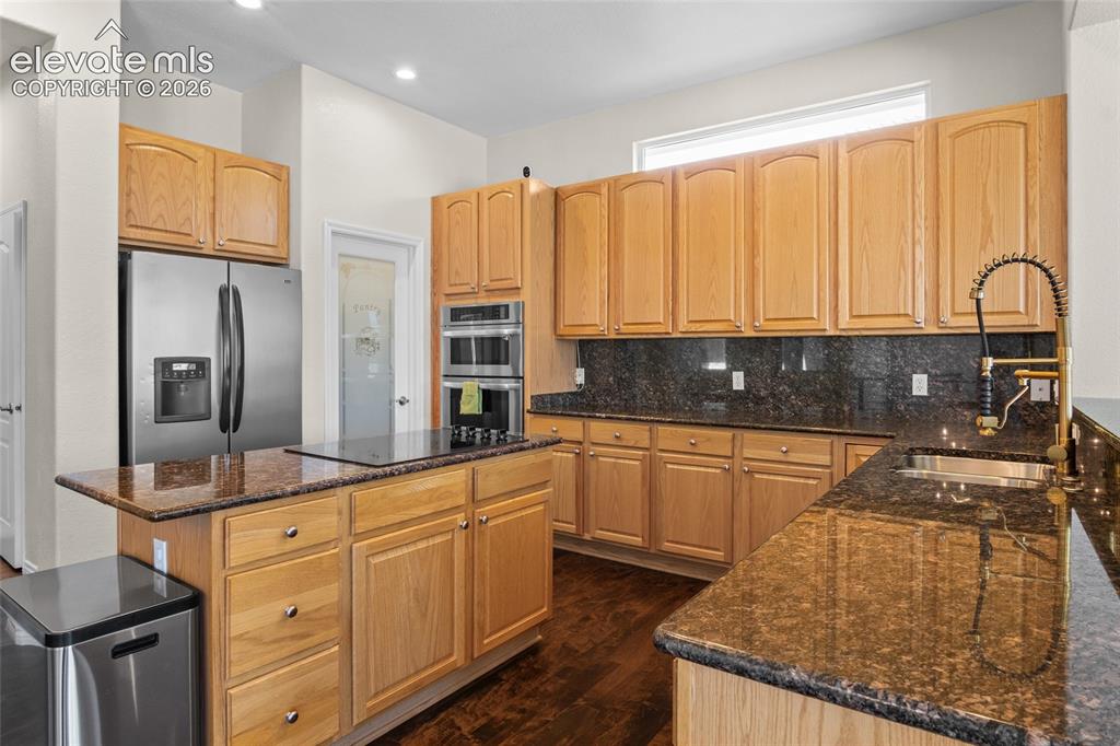 Image 19 of 50: Eat in Kitchen with walk in Pantry