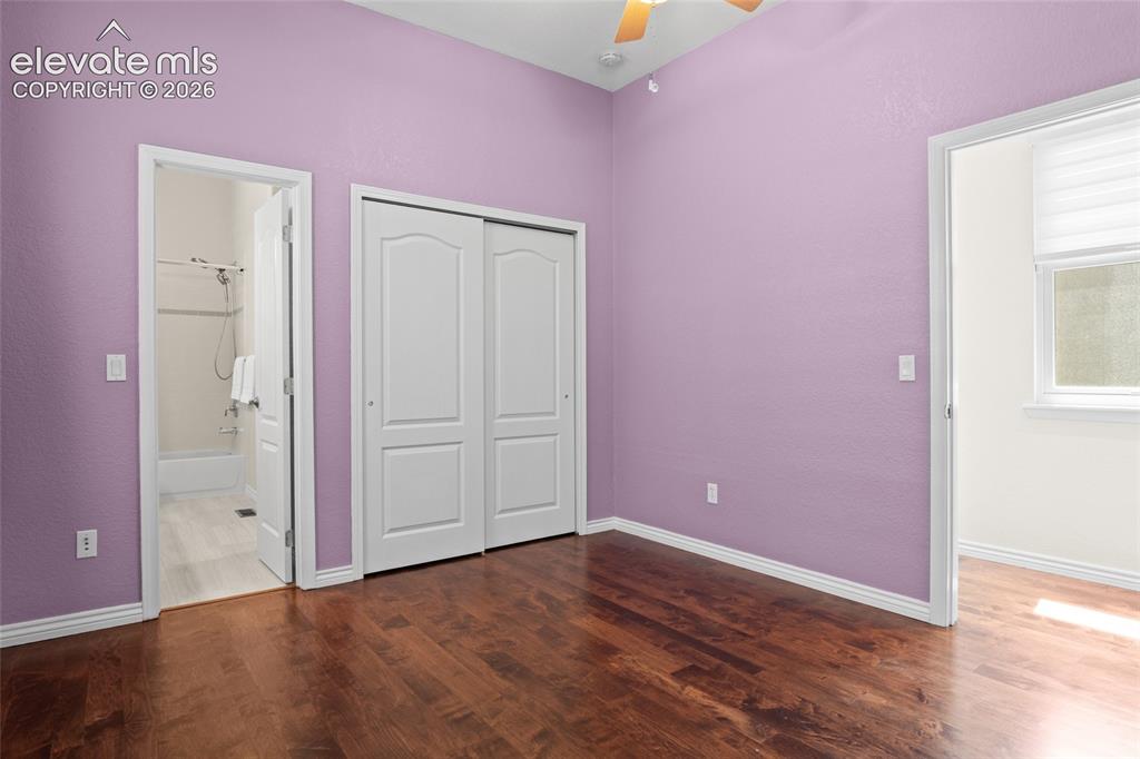 Image 25 of 50: Secondary bedroom on main floor attached to Jack n Jill bath