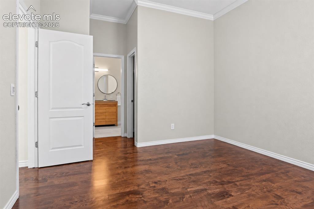 Image 25 of 44: Secondary bed #2 - Home Office or Guest Suite with Walk-In closet and acces