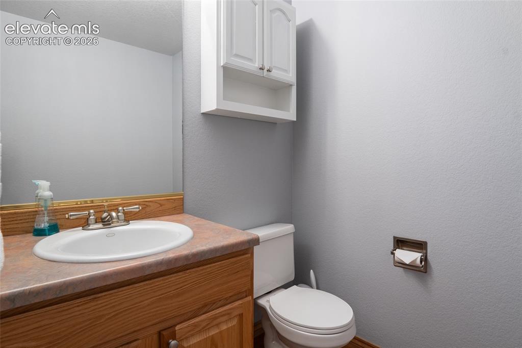Image 41 of 50: Half bath near Wet bar in LL