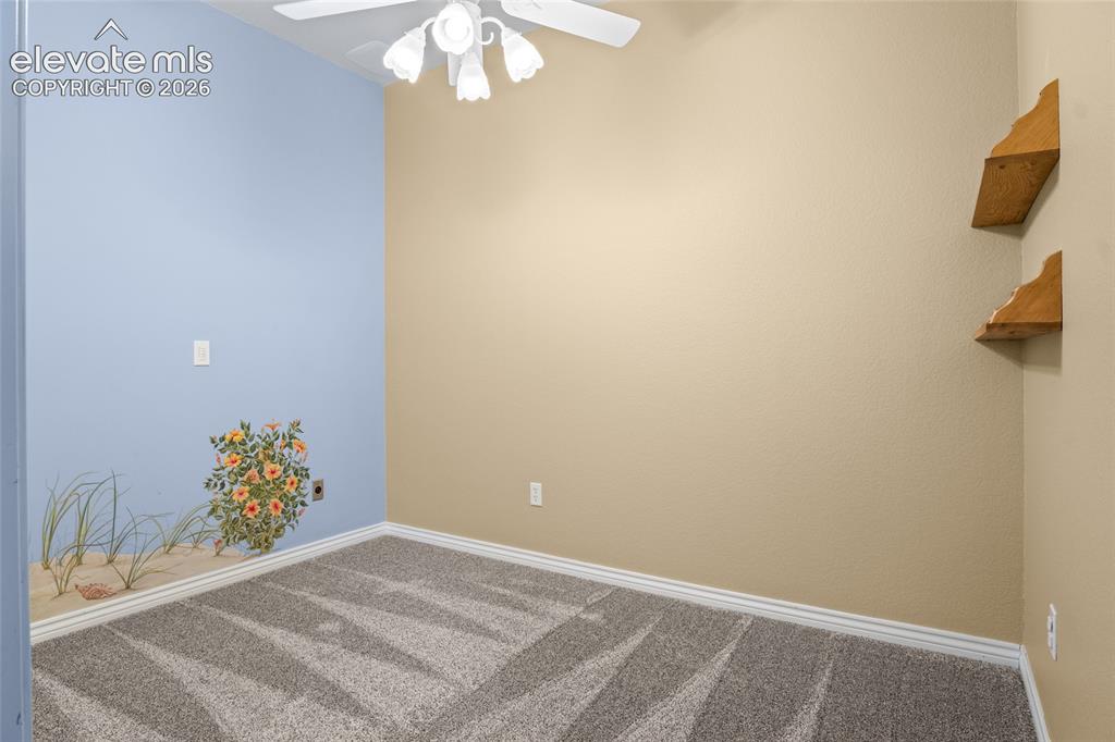 Image 43 of 50: Bonus non-conforming room. Play room? Craft room?