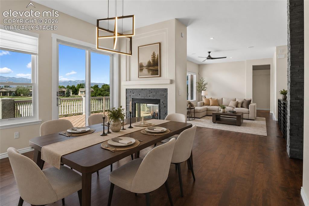 Image 8 of 50: Virtually staged - Formal Dining & Living Space