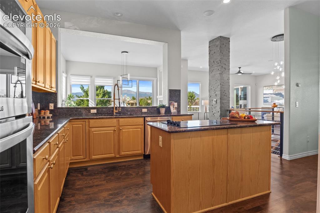 Image 8 of 44: Breathtaking mountain views from the open kitchen.