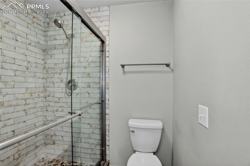 Image 14 of 28: Primary walk-in shower