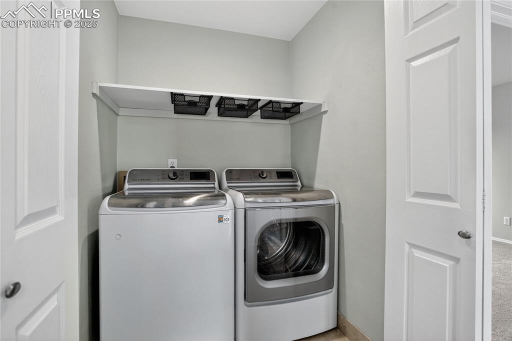 Image 19 of 28: Convenient upper level laundry