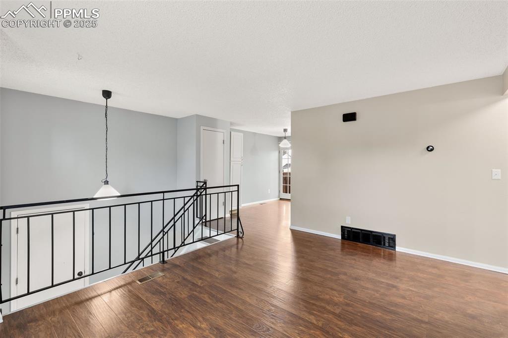 Image 11 of 22: Living room, engineered wood flooring