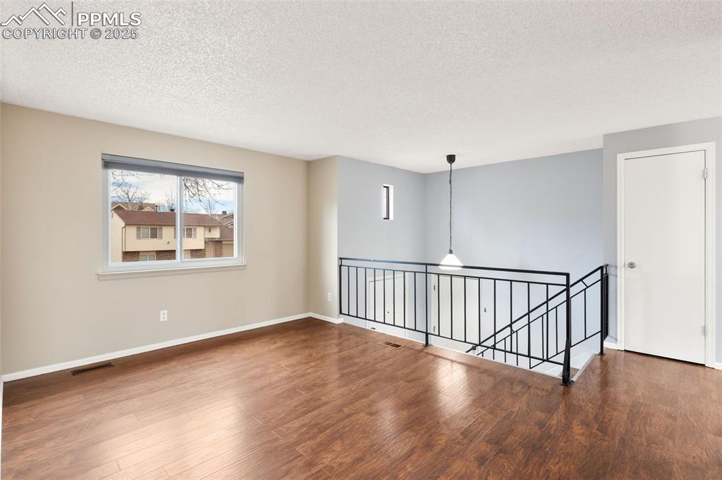 Image 12 of 22: Living room, engineered wood flooring