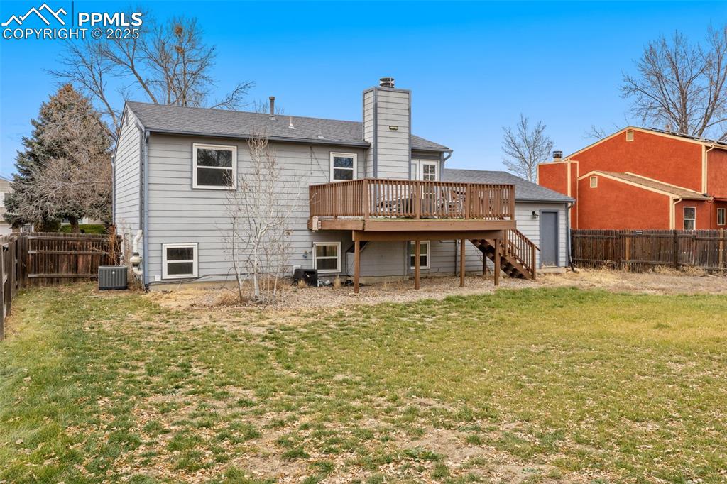 Image 21 of 22: Fenced backyard