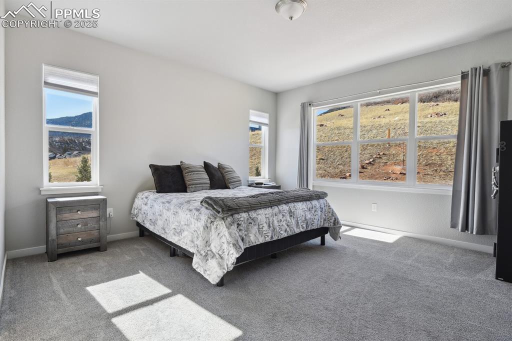 Image 25 of 47: Bedroom with carpet and baseboards