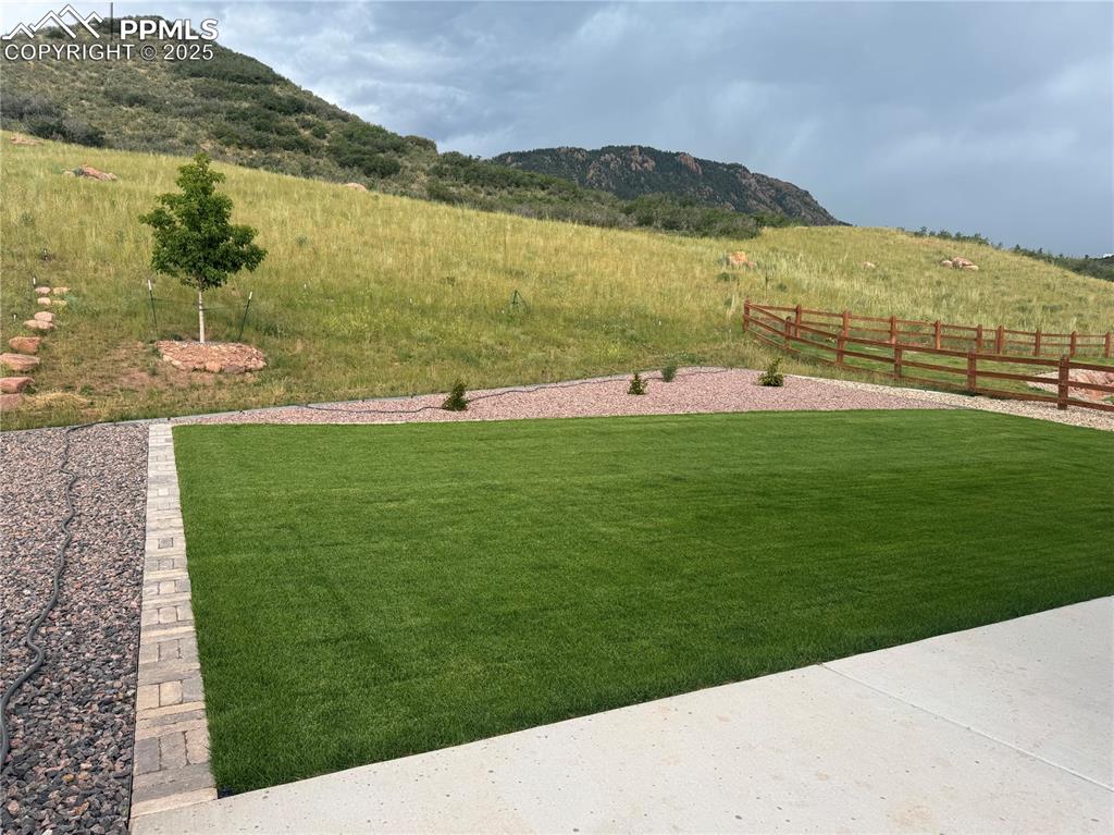 Image 45 of 47: View of yard with a mountain view and a view of countryside