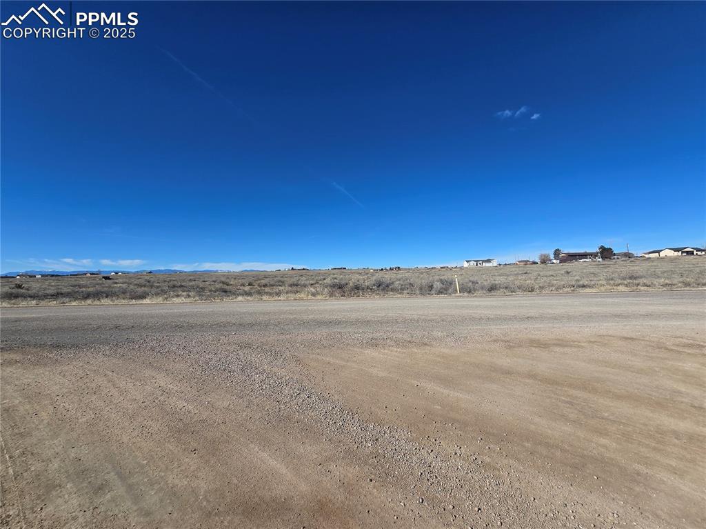 Image 4 of 5: View of yard featuring a rural view