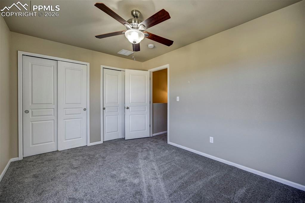 Image 28 of 44: Lots of closet space in secondary bedroom.