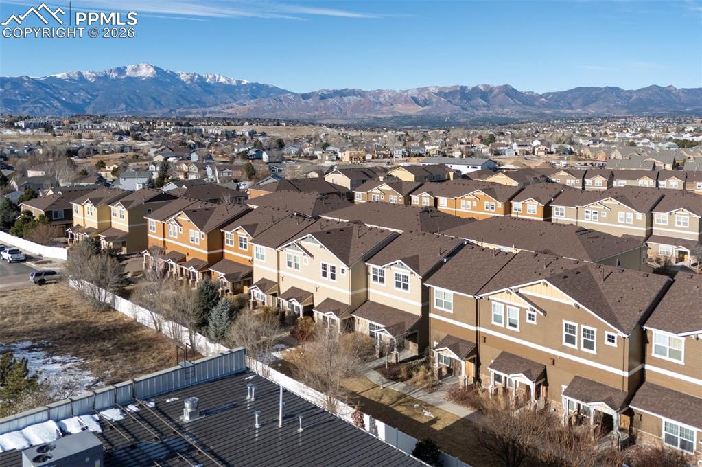 Image 3 of 44: Mountain views from inside the home and balcony.