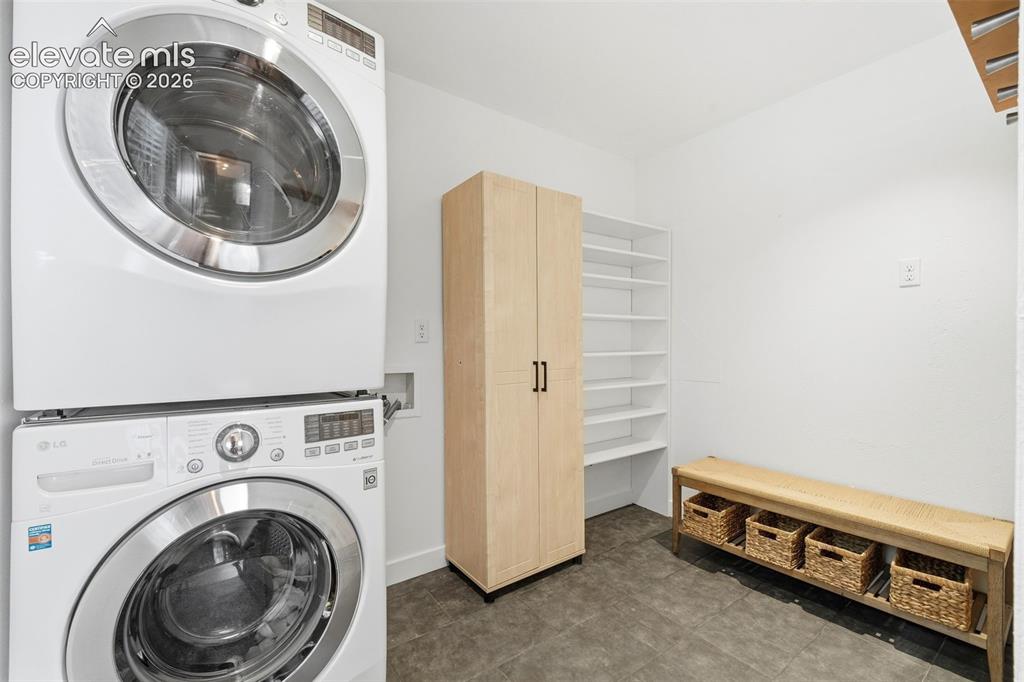 Image 20 of 48: Dedicated laundry/mud room right off the garage