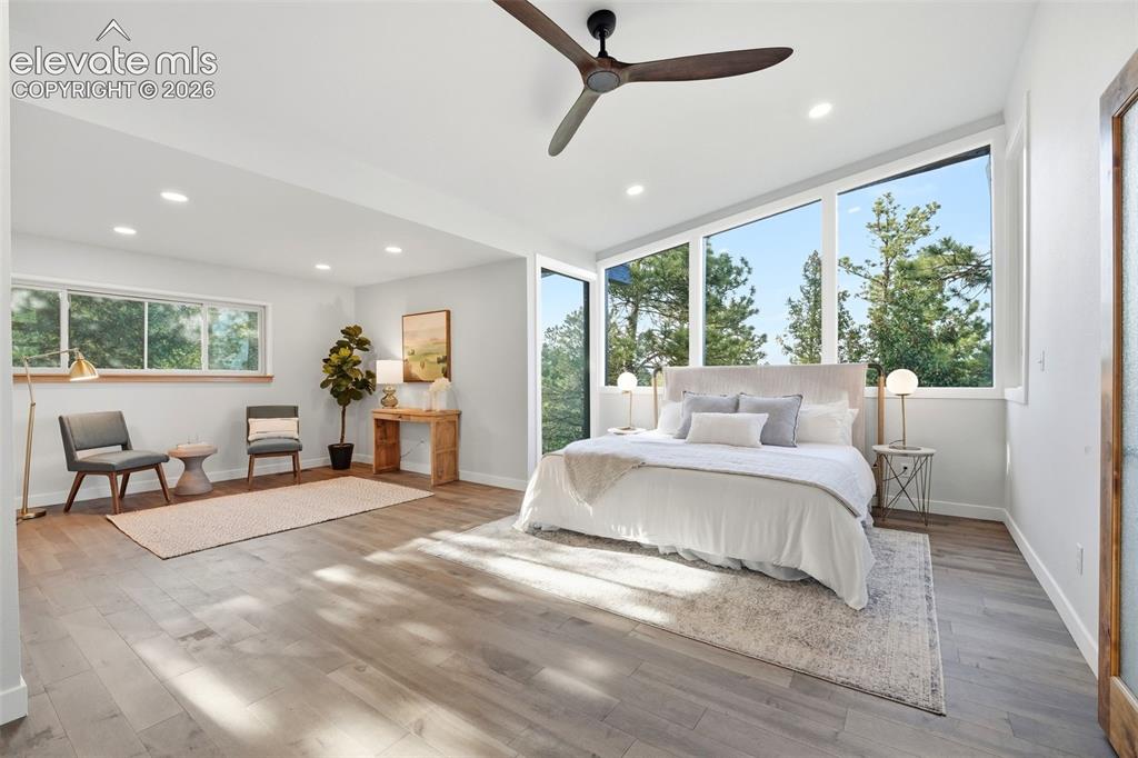 Image 21 of 48: Primary suite with expansive views