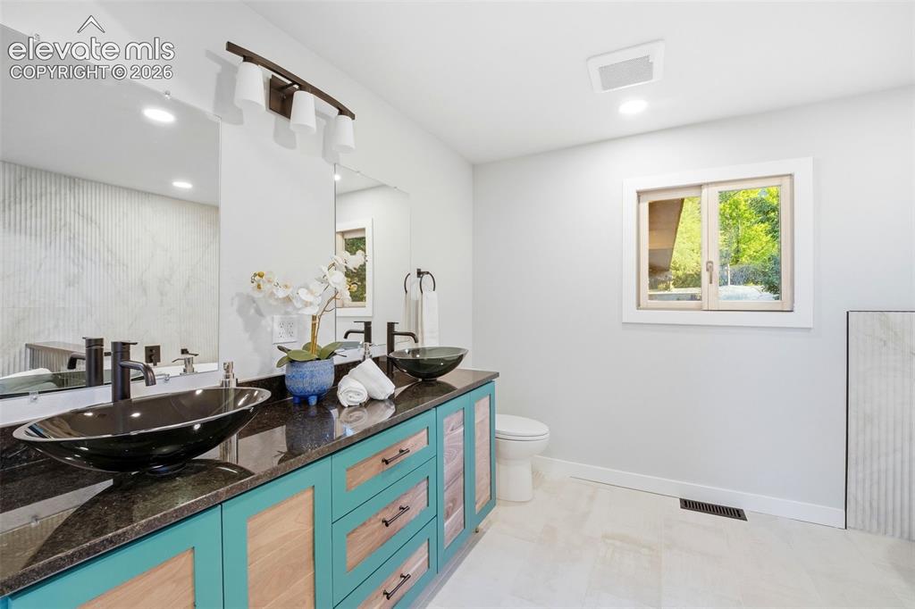 Image 25 of 48: Beautiful renovated primary bathroom