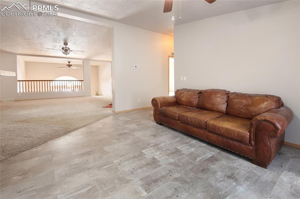 Image 17 of 50: Dining room with living room adjacent