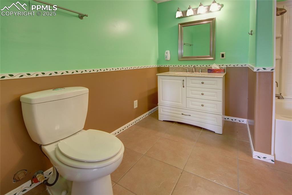 Image 38 of 50: Full basement bathroom